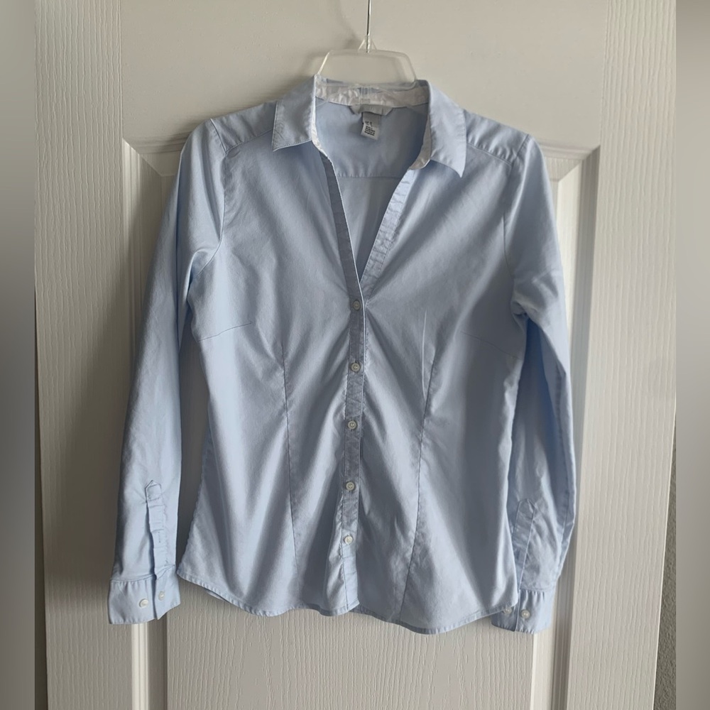 HM light blue long sleeved button up blouse size 12